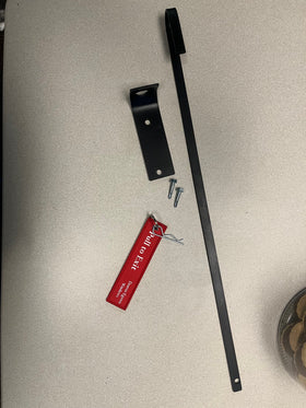 Egress window well grate locks parts including a locking mechanism, metal bracket, screws, and an emergency release tag.